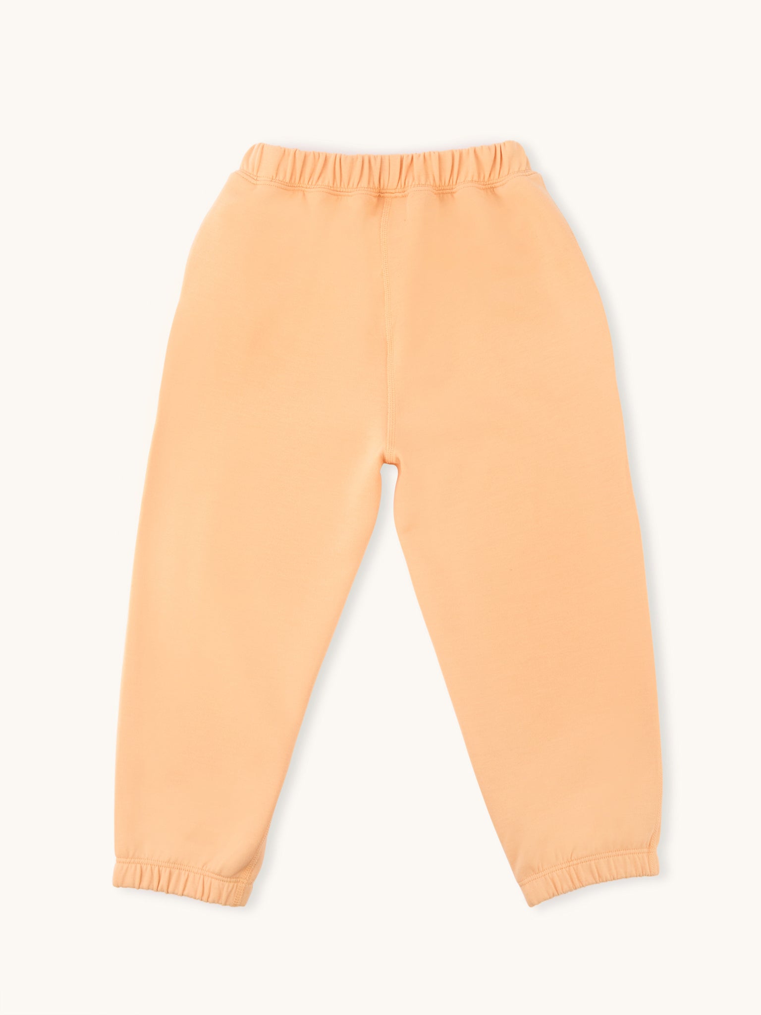 farren kids joggers in apricot from the back