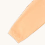 apricot kids joggers stitching closeup 