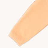 apricot kids joggers stitching closeup 