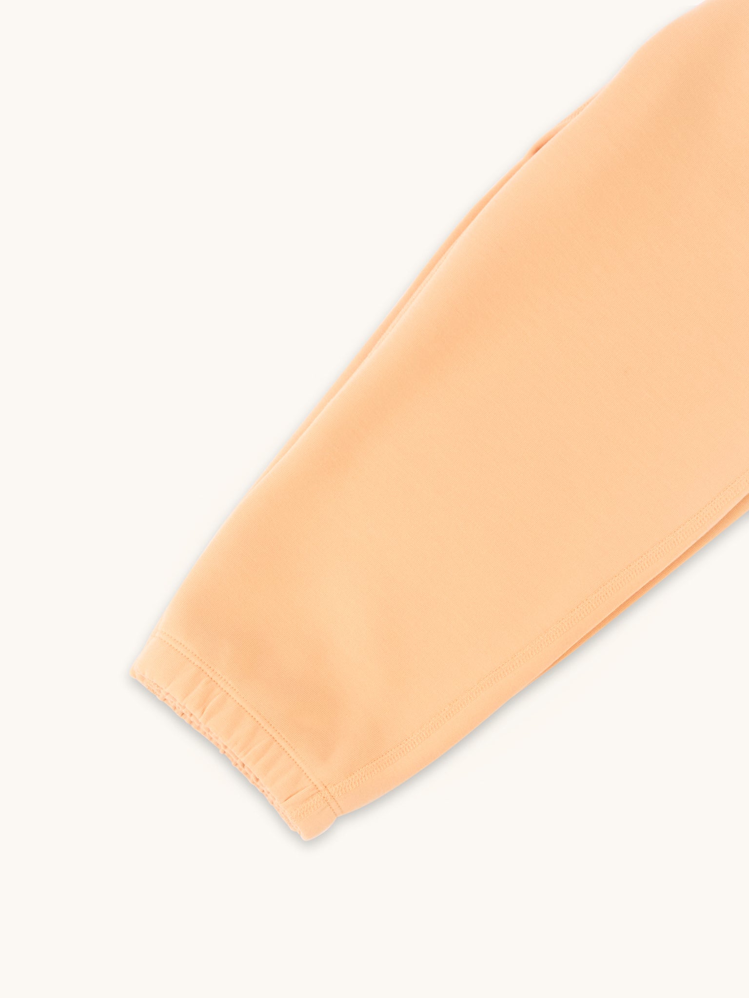 apricot kids joggers stitching closeup 