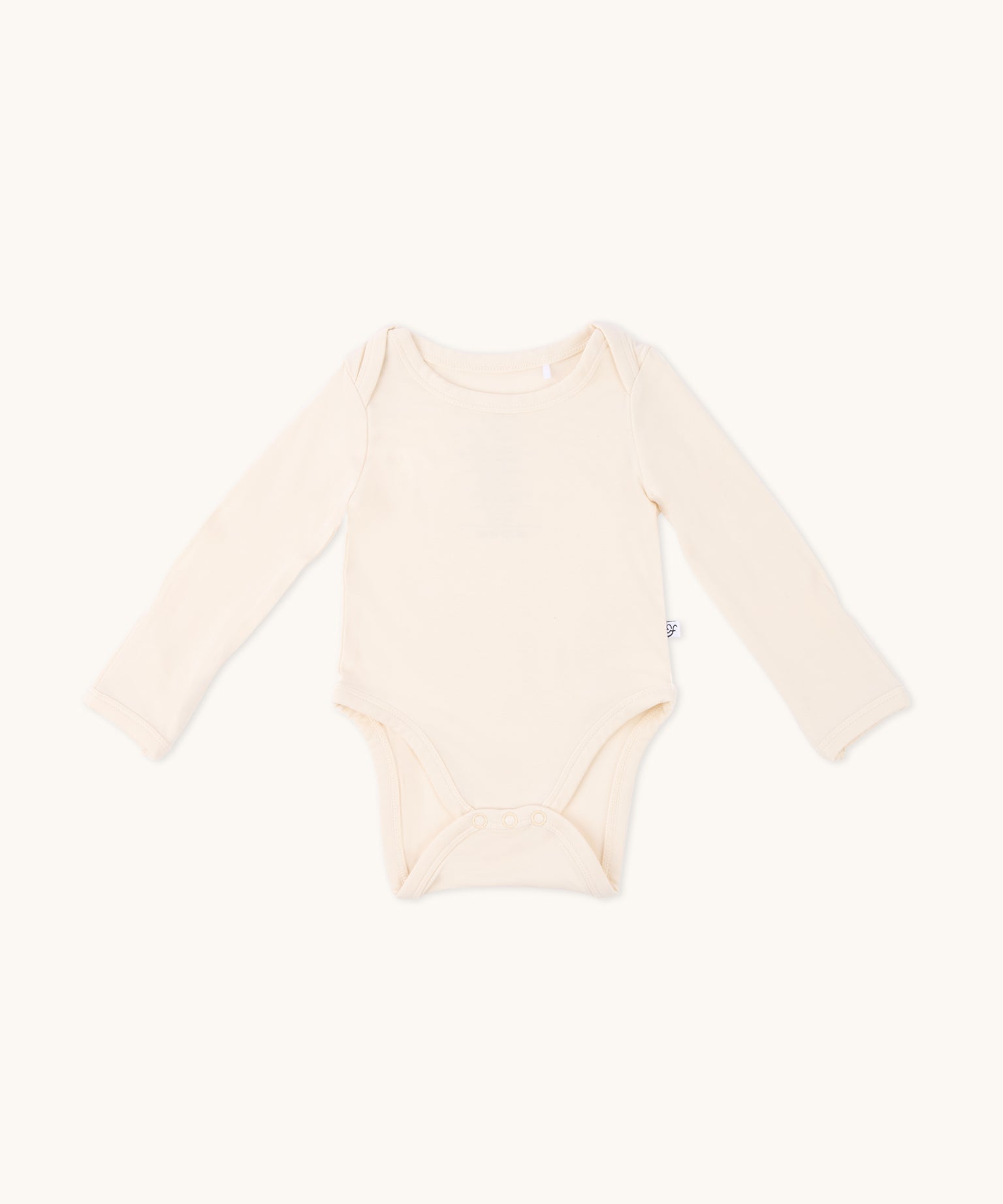 Long sleeve onesie in sand yellow 
color