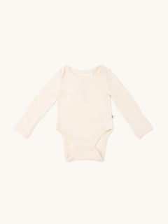 Long sleeve onesie in sand yellow 
color