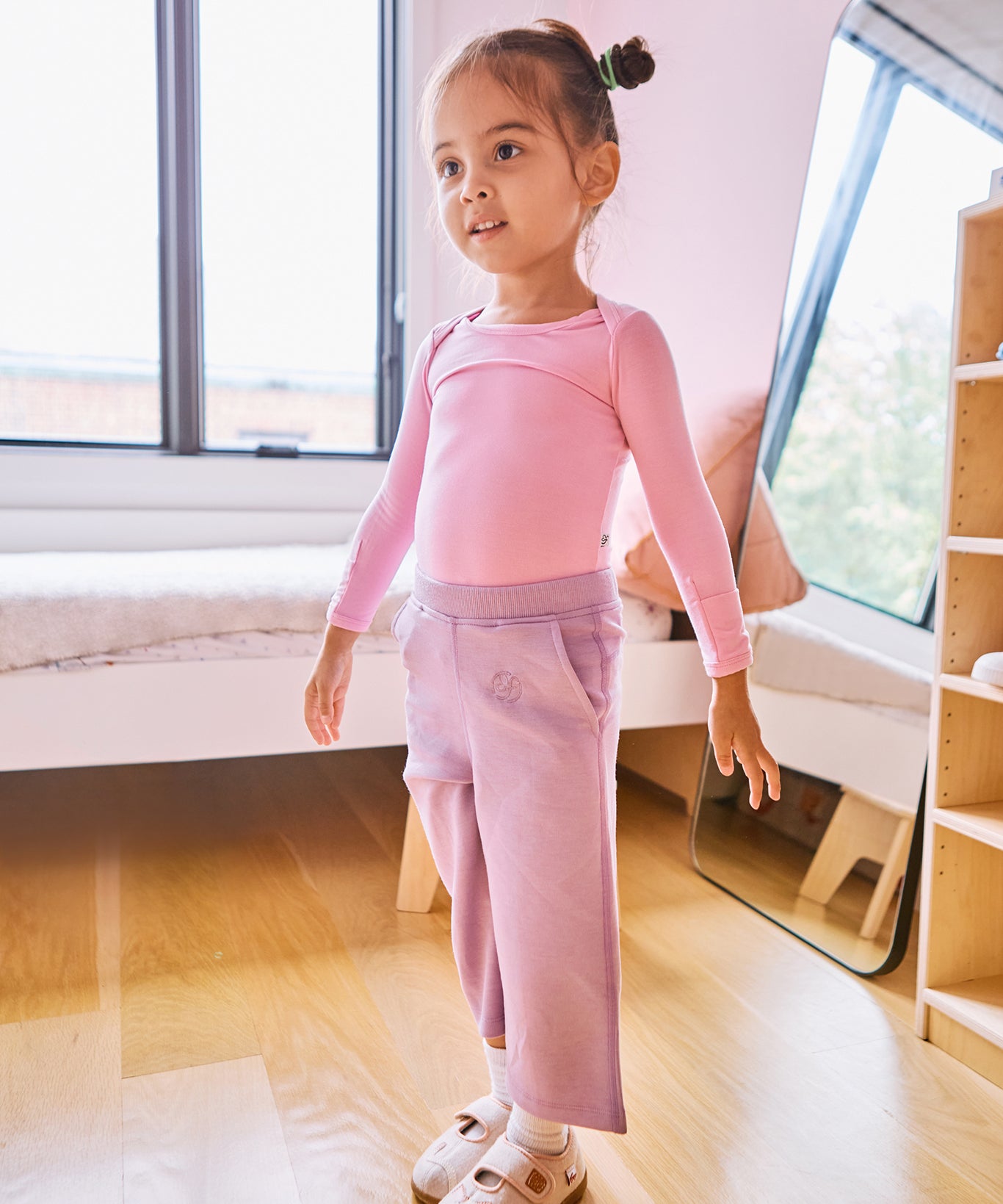 young girl wearing straight pant lilac