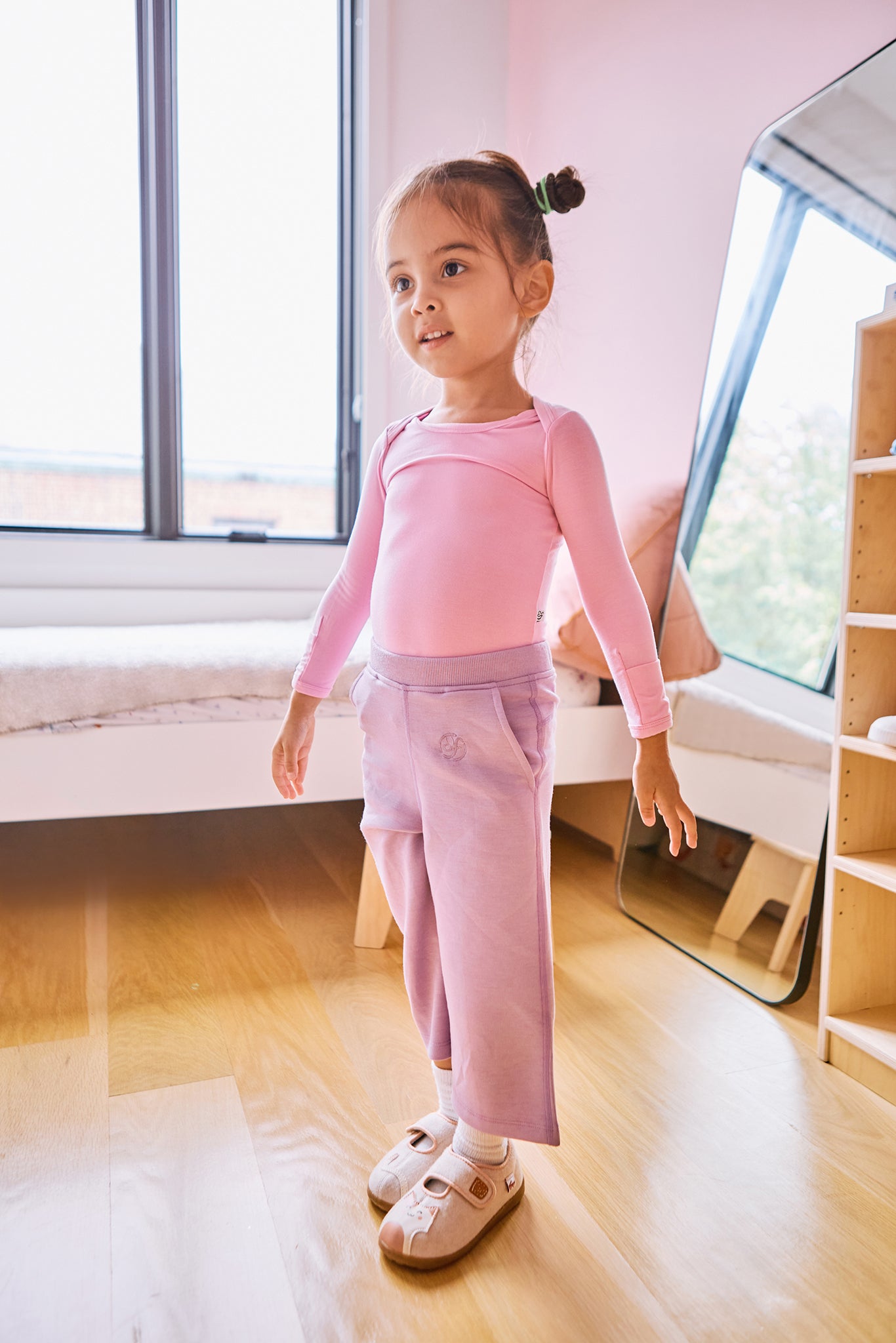 young girl wearing straight pant lilac