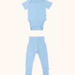 Zoomed-out view of a baby onesie and leggings bundle in glacier blue color.