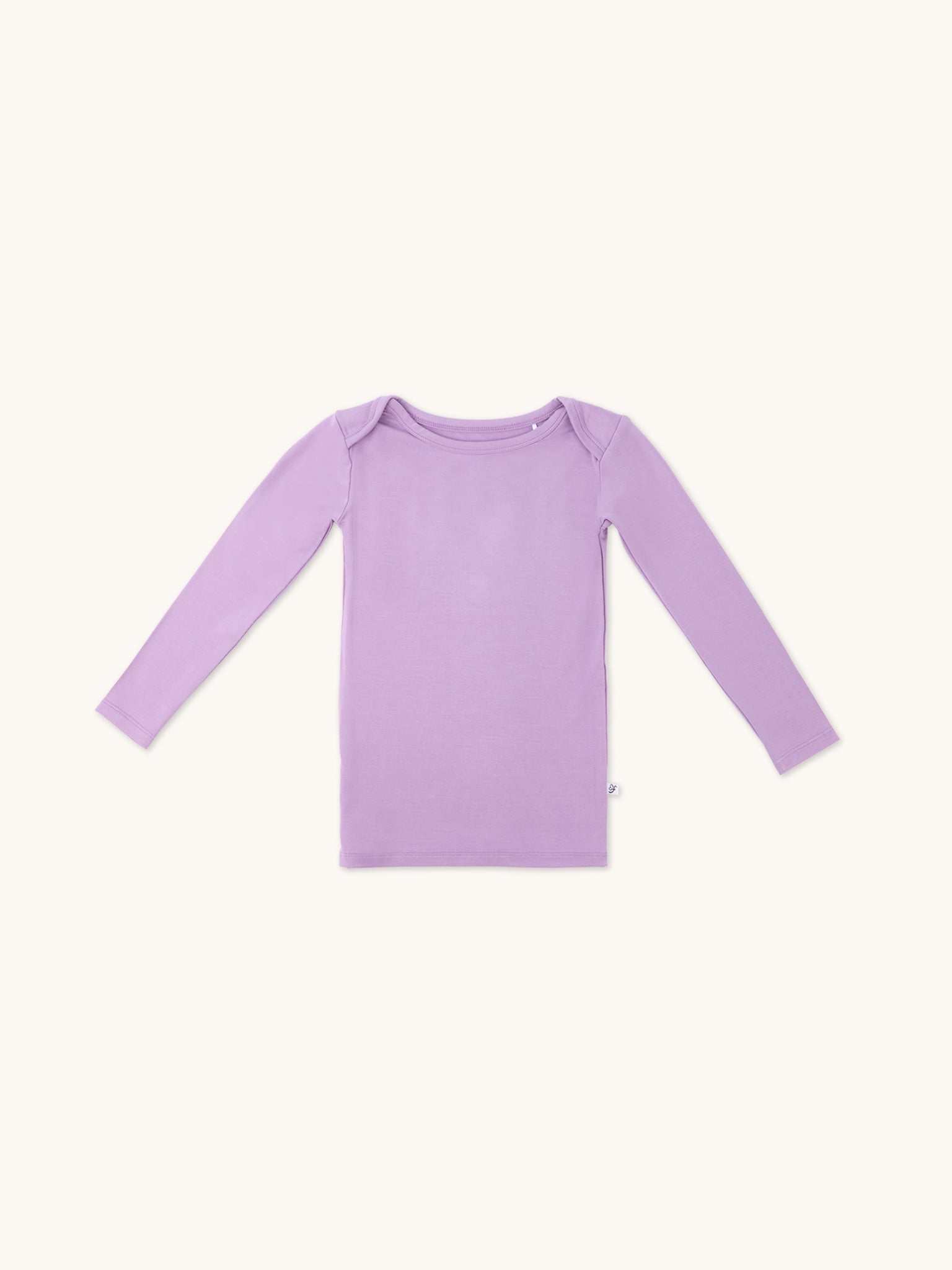 Zoomed-out view of a long sleeve lilac t-shirt for kids from the front.