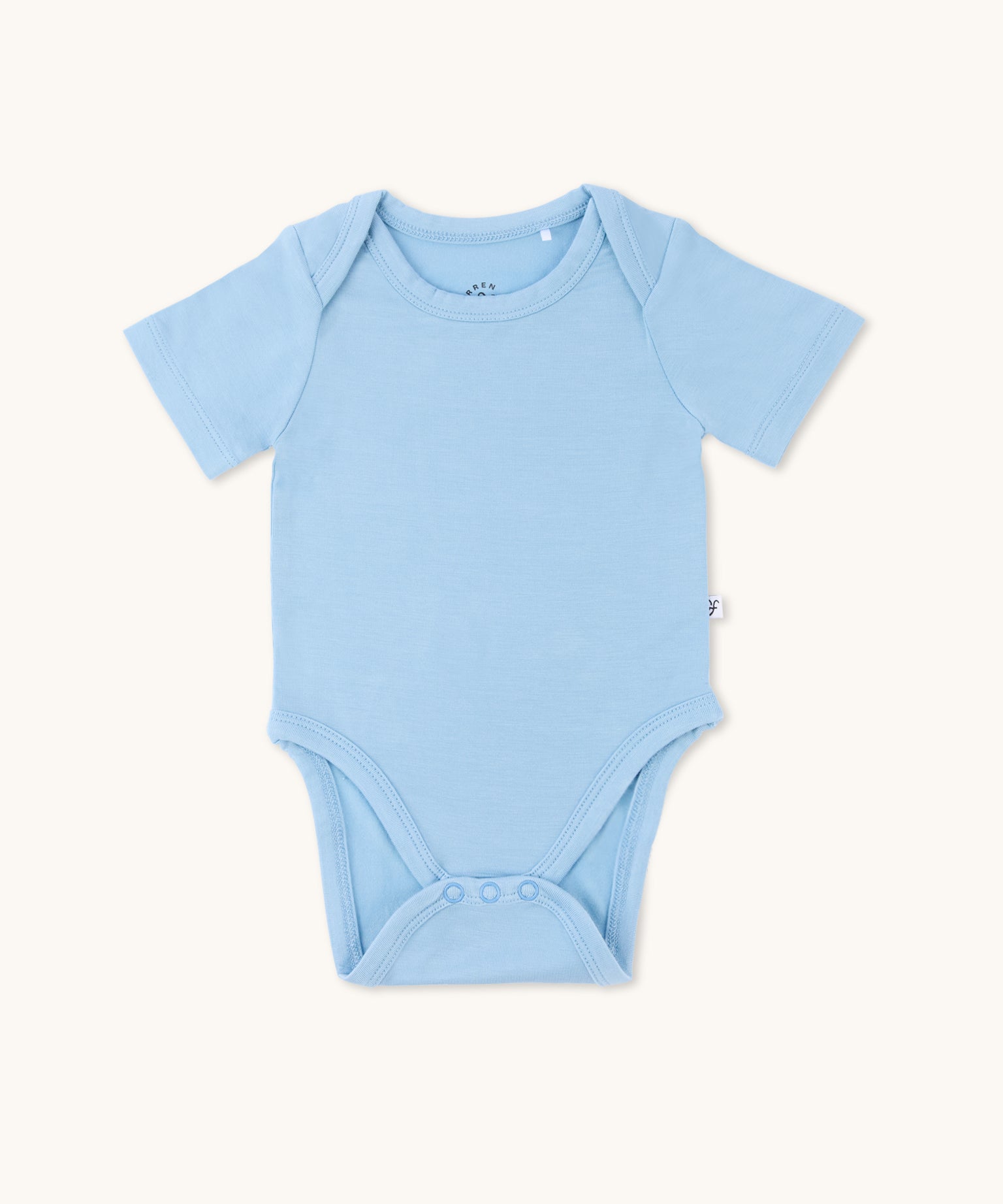 Zoomed-out view of a short sleeve onesie in glacier color